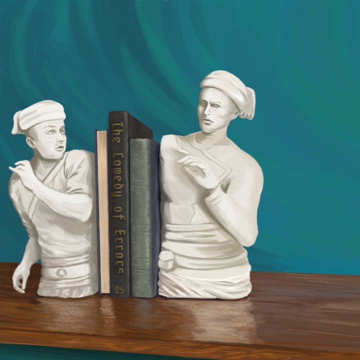 two character bookends holding shakespeare books